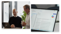 Zwei Mitarbeitende im Büro an einem Laptop neben einem Monitor mit geöffneter Softwareanwendung